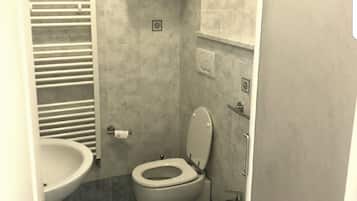 Baignoire et douche séparées, sèche-cheveux, bidet, serviettes fournies