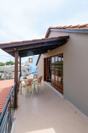 Villa | Balcony view - Seafront Paradise with sand Yard 10 m. from Beach! (Platanias)
