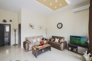 Apartamento | Área de estar | TV de tela plana