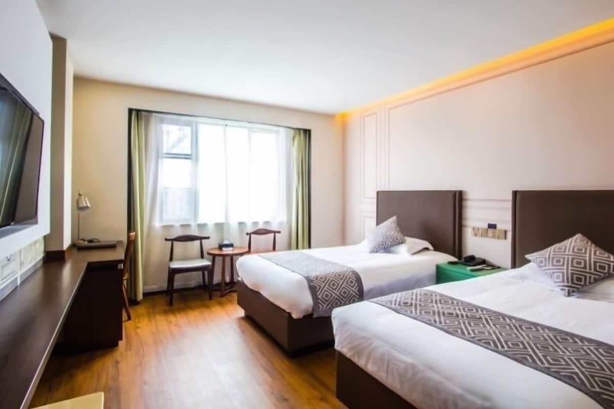 Habitación Confort con 2 camas individuales | Wifi gratis y ropa de cama