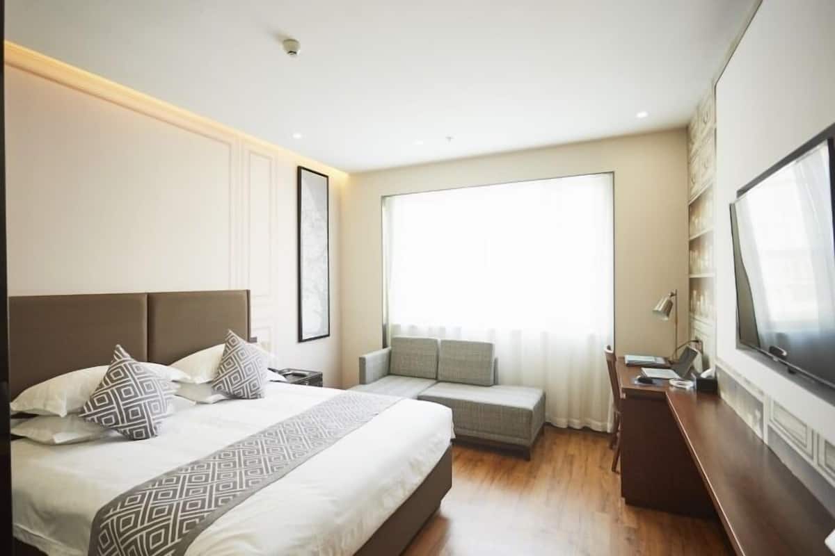Habitación superior, 1 cama Queen size | Wifi gratis y ropa de cama