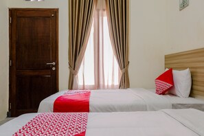 Habitación Deluxe con 2 camas individuales | Escritorio y wifi gratis