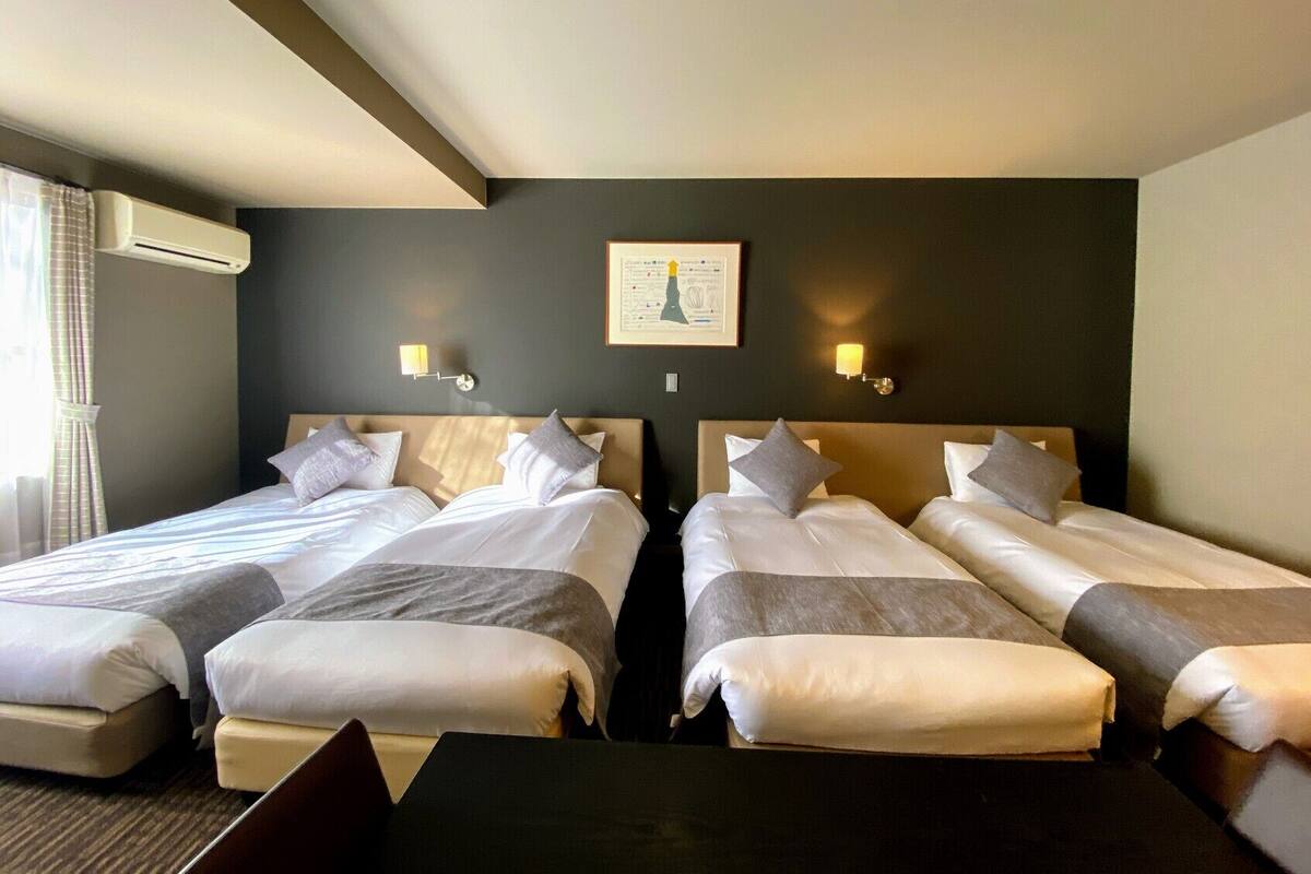 Desk, laptop workspace, free WiFi, bed sheets