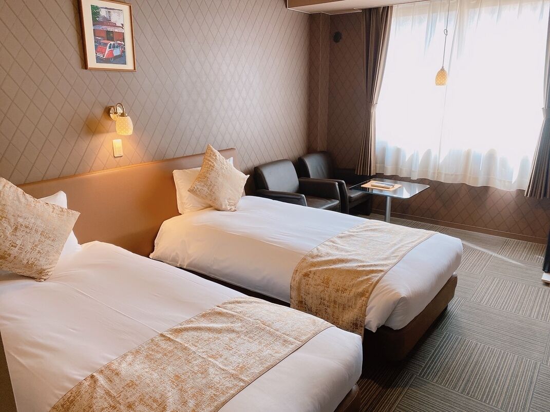 Desk, laptop workspace, free WiFi, bed sheets