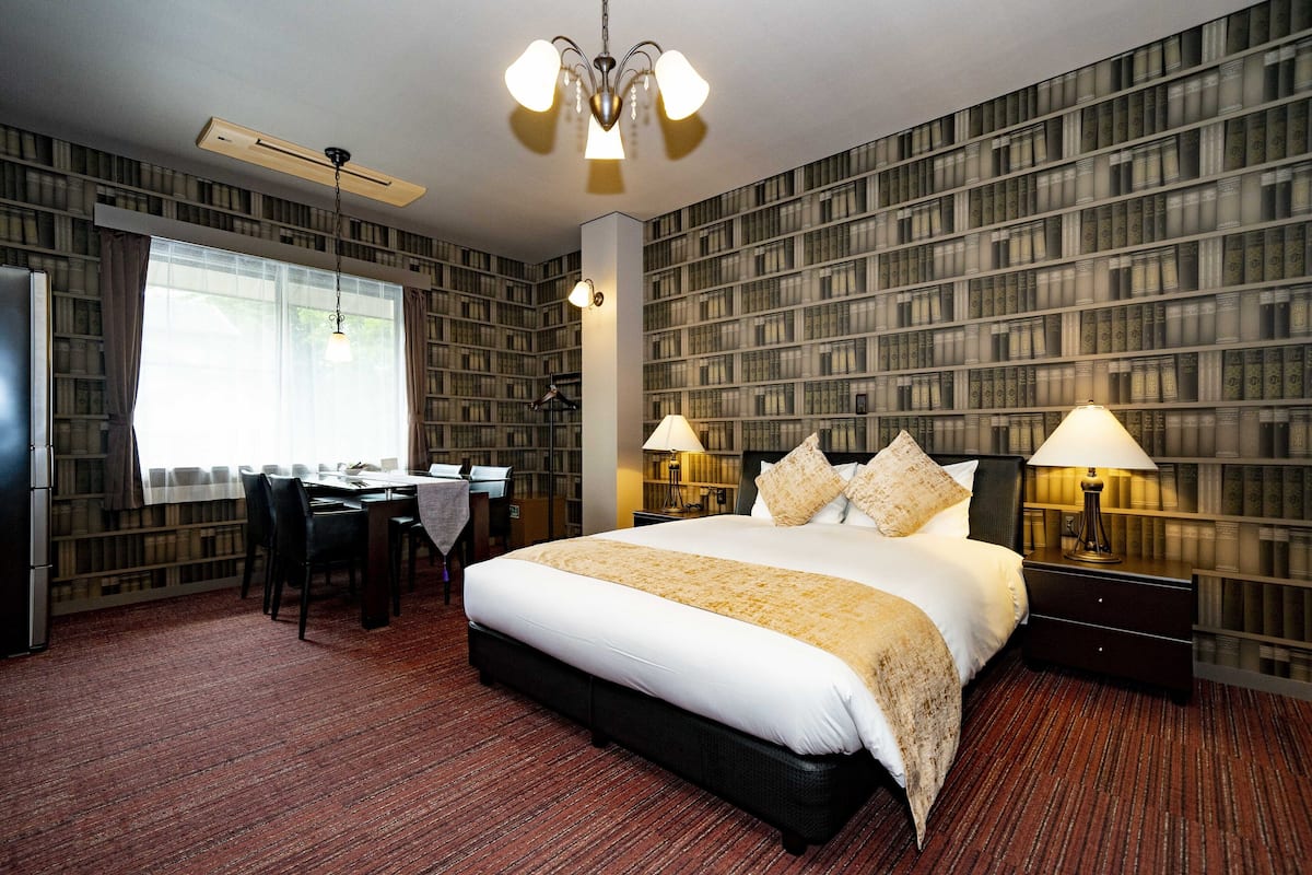 Deluxe Quadruple Room, Non Smoking | Desk, laptop workspace, WiFi (free), bed sheets
