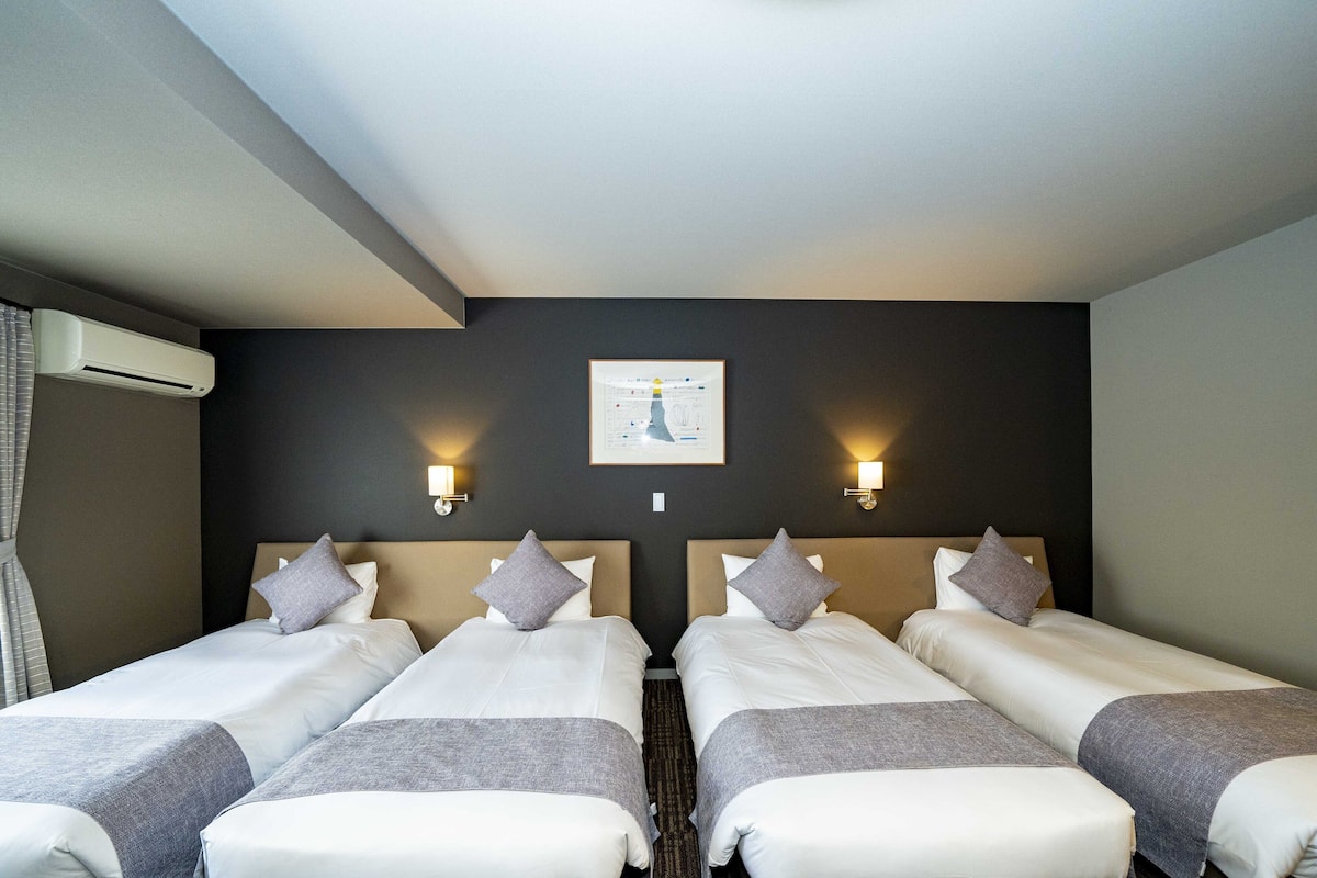 Basic Quadruple Room, Non Smoking | Desk, laptop workspace, WiFi (free), bed sheets