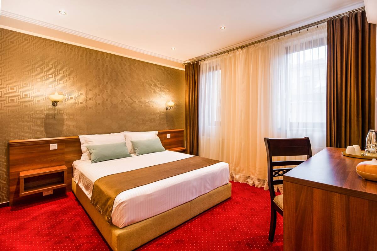 Premium bedding, pillowtop beds, desk, laptop workspace