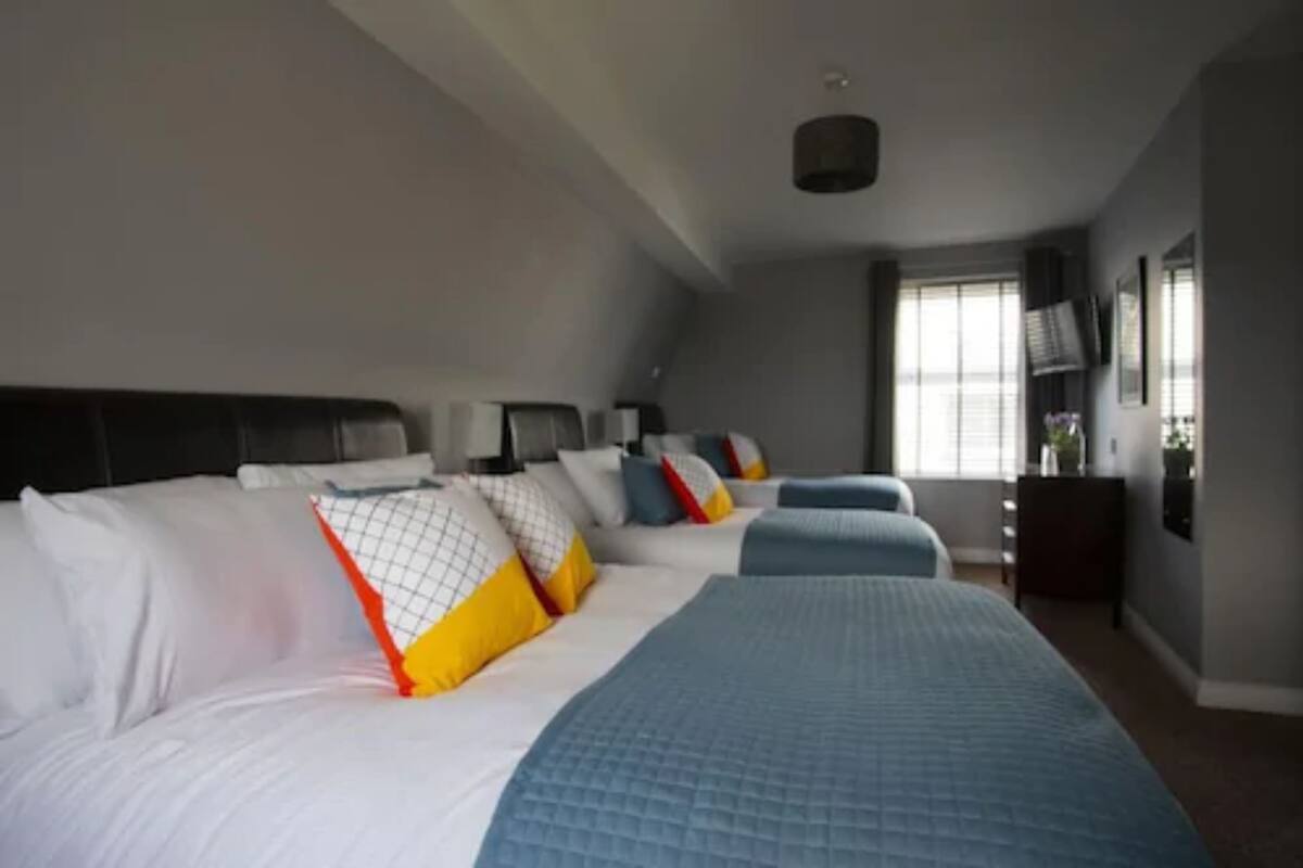 Family Room | Hypo-allergenic bedding, blackout drapes, iron/ironing board, free WiFi
