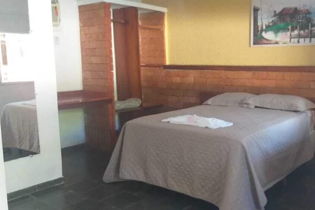 Habitación estándar con 1 cama matrimonial o 2 individuales | Minibar, insonorización, wifi gratis y acceso para silla de ruedas