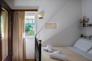 1 bedroom, desk, iron/ironing board, travel cot