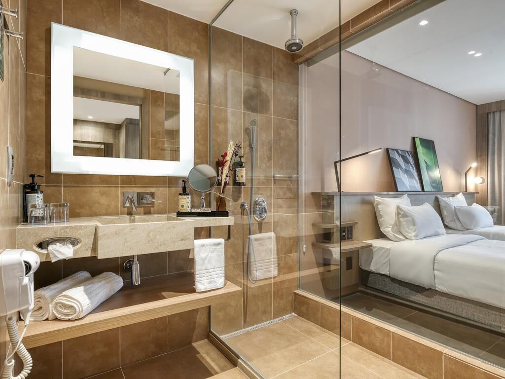 Executive kamer, 2 eenpersoonsbedden | Een minibar, een kluis op de kamer, gratis wifi, beddengoed