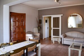 Maison, 2 chambres | Coin séjour | Télévision à écran plat
