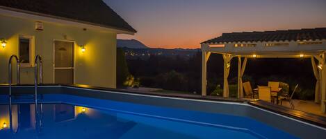 Outdoor pool, pool umbrellas, pool loungers