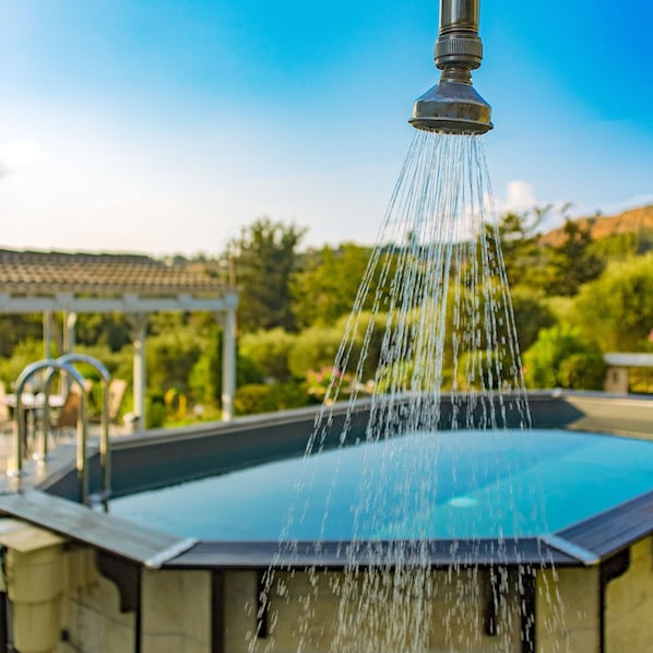 Outdoor pool, pool umbrellas, pool loungers