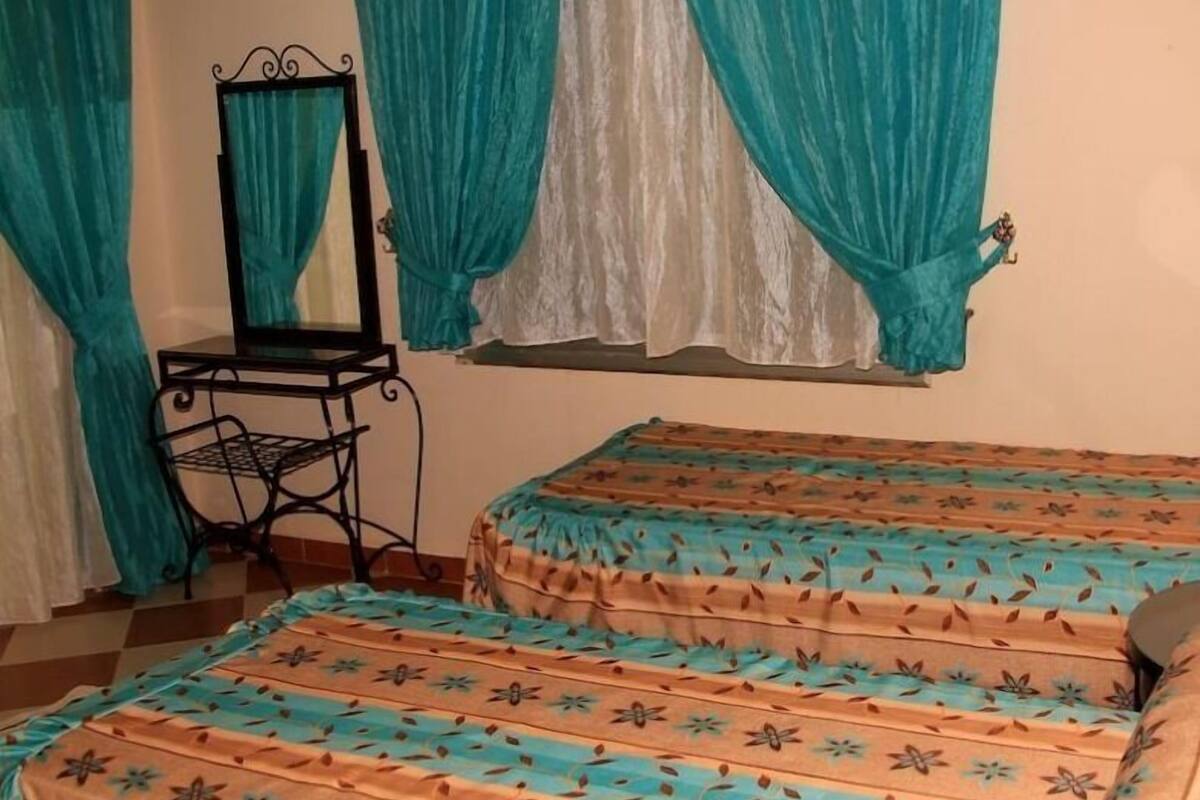 Twin Room | Desk, blackout curtains, free cots/infant beds, rollaway beds