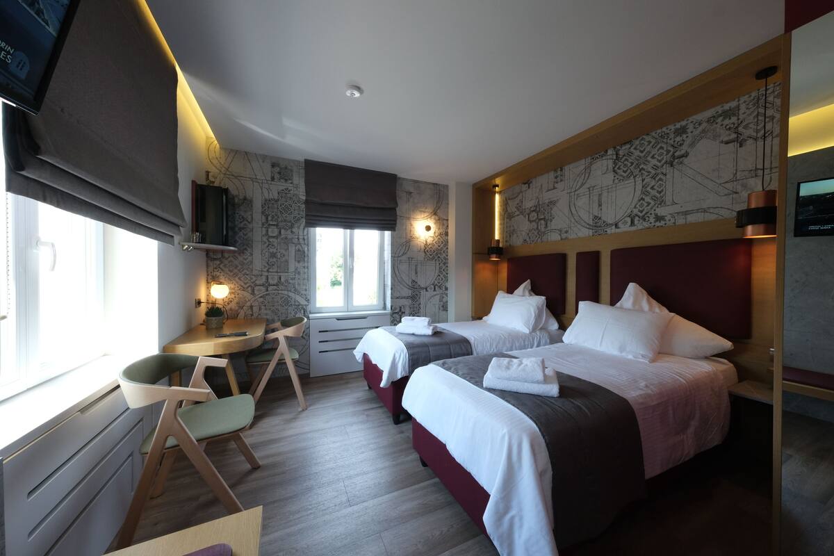 Twin Room | Hypo-allergenic bedding available, desk, laptop workspace