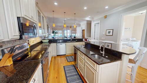 Spacious, pet-friendly escape located just steps from the beach.