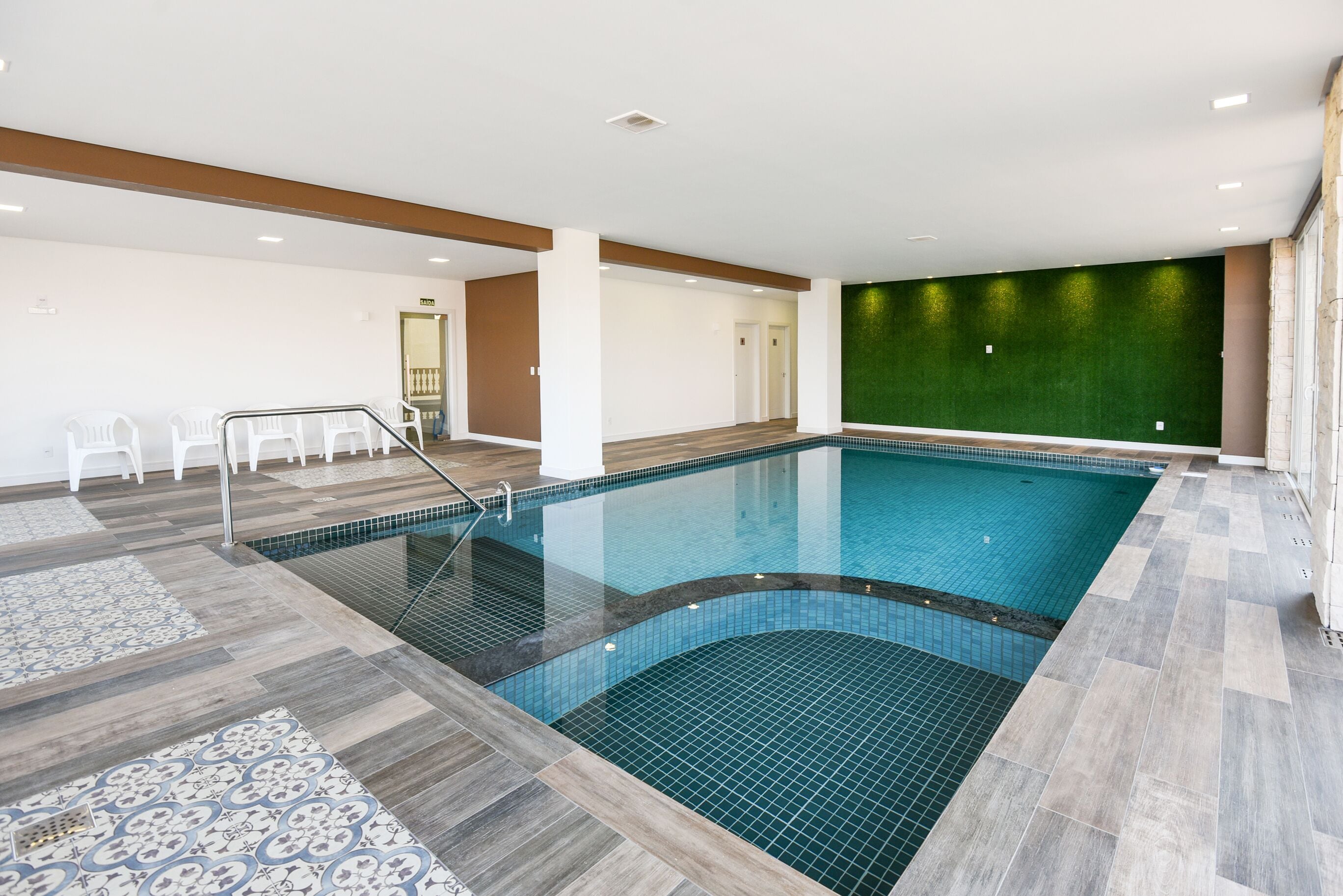 indoor pool, open 9:00 am to 11:00 pm, pool loungers