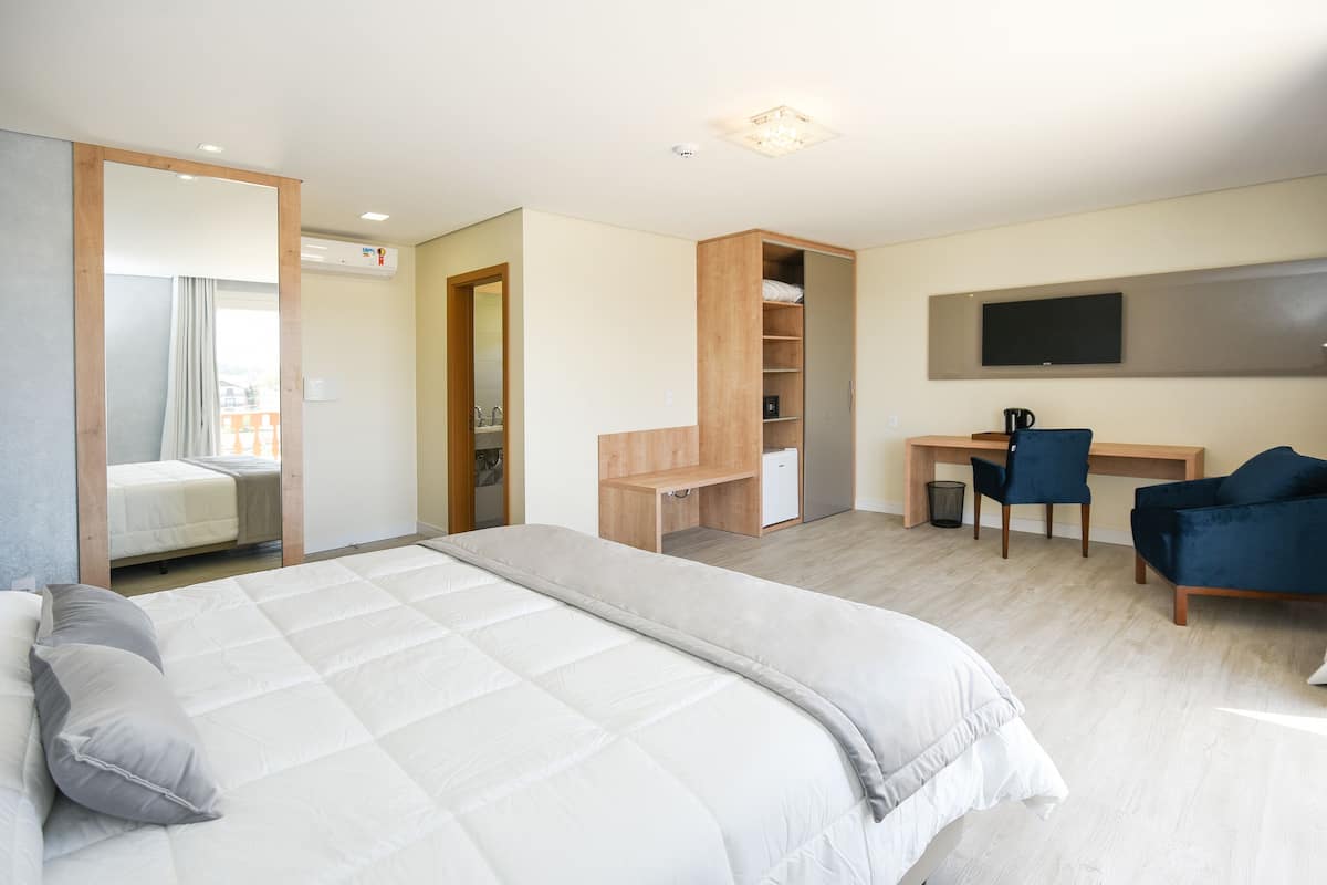 Superior Room | Free minibar items, in-room safe, desk, laptop workspace