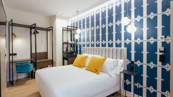 Down comforters, memory foam beds, minibar, in-room safe