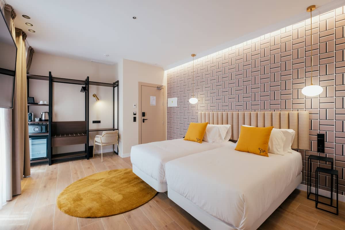 Down duvets, memory-foam beds, minibar, in-room safe