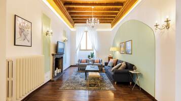 Apartment, 4 Bedrooms | Living area | 21-inch flat-screen TV with digital channels, TV