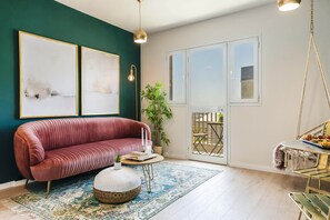 Apartment, 1 Bedroom, Balcony, City View | Living area | 21-inch flat-screen TV with digital channels, TV