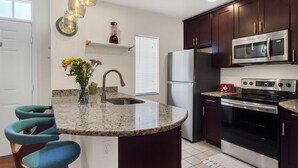 Luxury Villa, 4 Bedrooms, Courtyard View | Private kitchen | Coffee/tea maker, full-size fridge, microwave, oven - Free Resort Access 4 Bedroom Near Disney with Themed Rooms (Kissimmee)