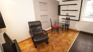 Apartamento urbano | Área de estar | TV de tela plana