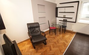 City Apartment | Living area | Flat-screen TV