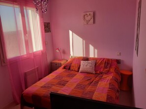 Blackout curtains, iron/ironing board, free WiFi, bed sheets