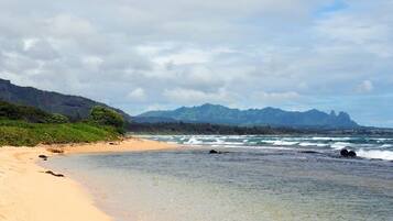 On the beach, sun loungers, beach towels