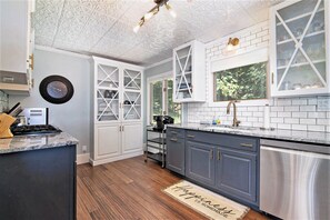 Fridge, microwave, oven, stovetop - West Bay Waterfront Home (Traverse City)