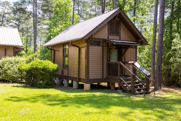 One pod with 8 bunk beds inside, three more just like it.