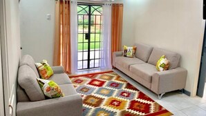 Flat-screen TV - Cozy Hilltop Apt w/ Scenic Mountain + City Views (Port of Spain)