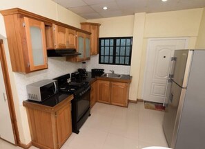 House | Private kitchen | Fridge, microwave, stovetop, coffee/tea maker - Stacys Place St James Studio Apartment (Port of Spain)