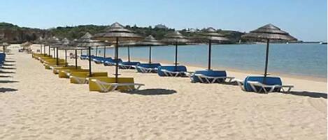 On the beach, beach towels