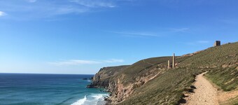 A single-storey barn conversion with access to wonderful coastal walks.