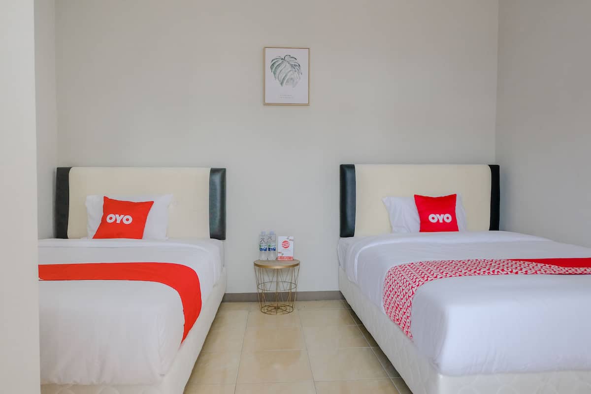 Habitación Deluxe con 2 camas individuales | Wifi gratis y ropa de cama