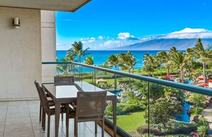 Outdoor dining - Maui Resort Rentals: Honua Kai Hokulani 448 - Spacious 2BR w/ Partial Ocean & Mountain Views! (Lahaina)