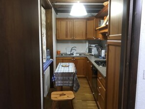 Microwave, coffee/tea maker, cookware/dishes/utensils