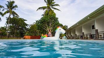 Outdoor pool, open 9:30 AM to 9:00 PM, pool umbrellas, pool loungers