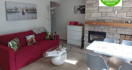 Apartment with pool, parking space, south-facing balcony, sauna, from May-Oct. Mountain railway ticket incl.