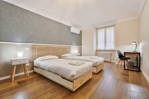 4 habitaciones, escritorio, tabla de planchar con plancha y wifi 