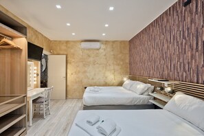 1 habitación, tabla de planchar con plancha, wifi y ropa de cama 