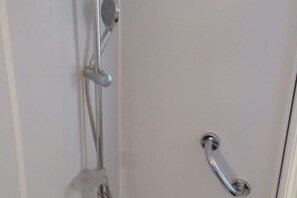 Combined shower/bathtub, hair dryer, bidet