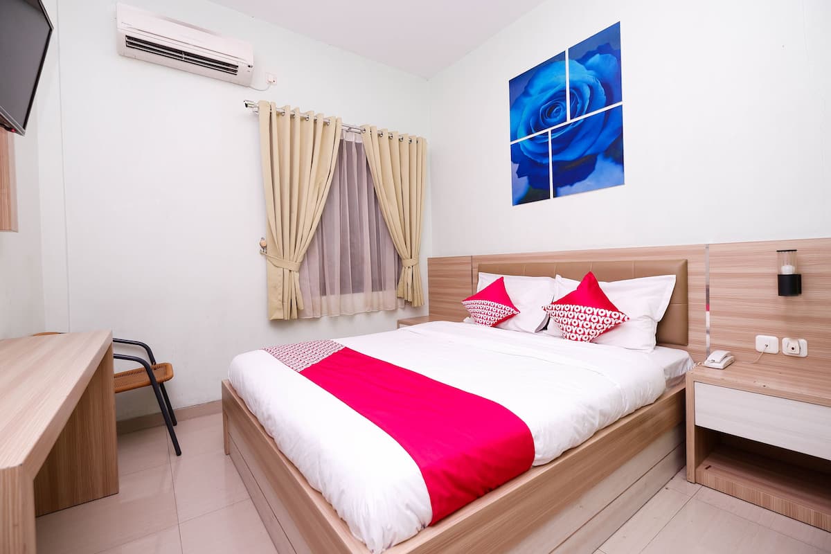 Habitación doble Deluxe | 1 habitación, escritorio, wifi gratis y ropa de cama