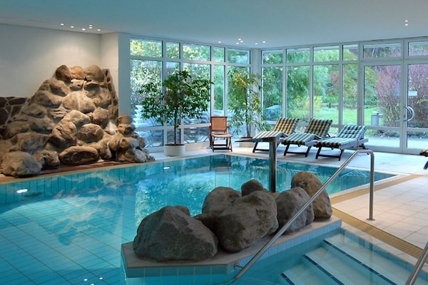Indoor pool, open 6:30 AM to 8:00 PM, pool loungers