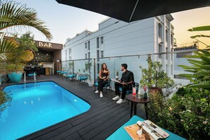Outdoor pool, pool umbrellas, pool loungers