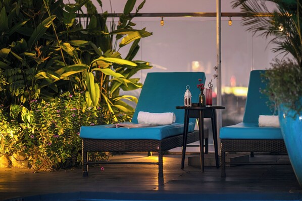 Outdoor pool, pool umbrellas, pool loungers